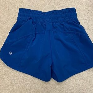 These are the tracker shorts 4” from Lululemon size four. Not very much use.